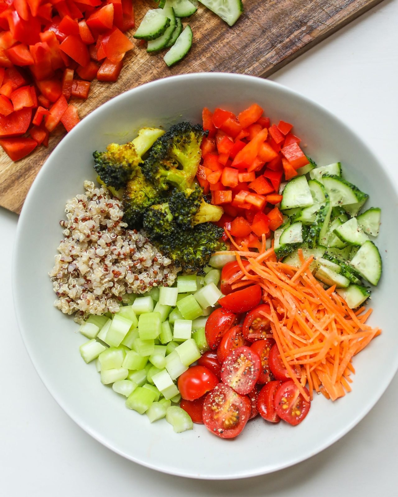 A colourful bowl of grains and roasted vegetables